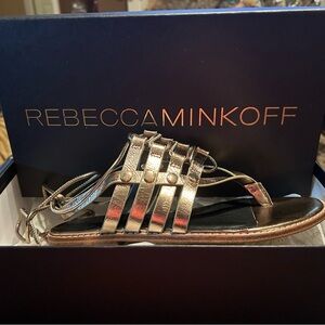 Rebecca Minkoff gold tie up the leg sandals. New in Box size 6.